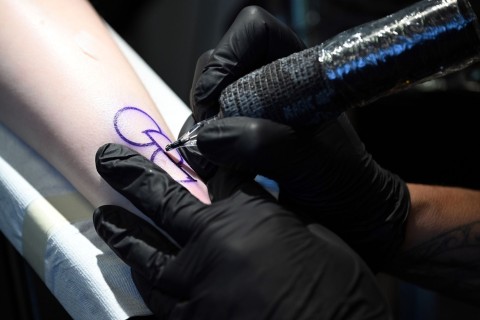 Tattoo statt Organspendeausweis: Symbol auf der Haut
